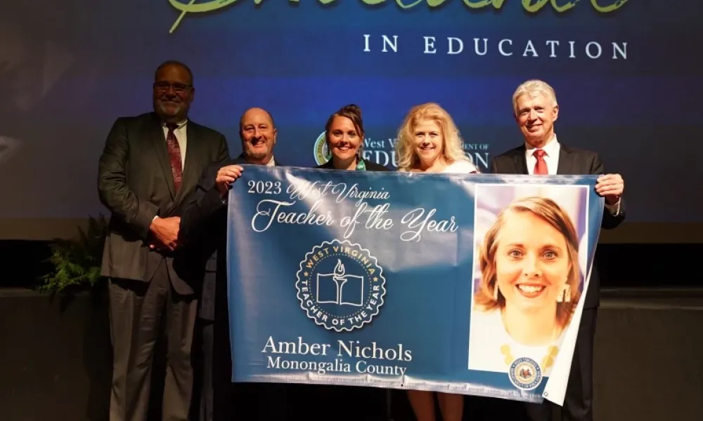 Group photo with 2023 Teacher of the Year Amber Nichols