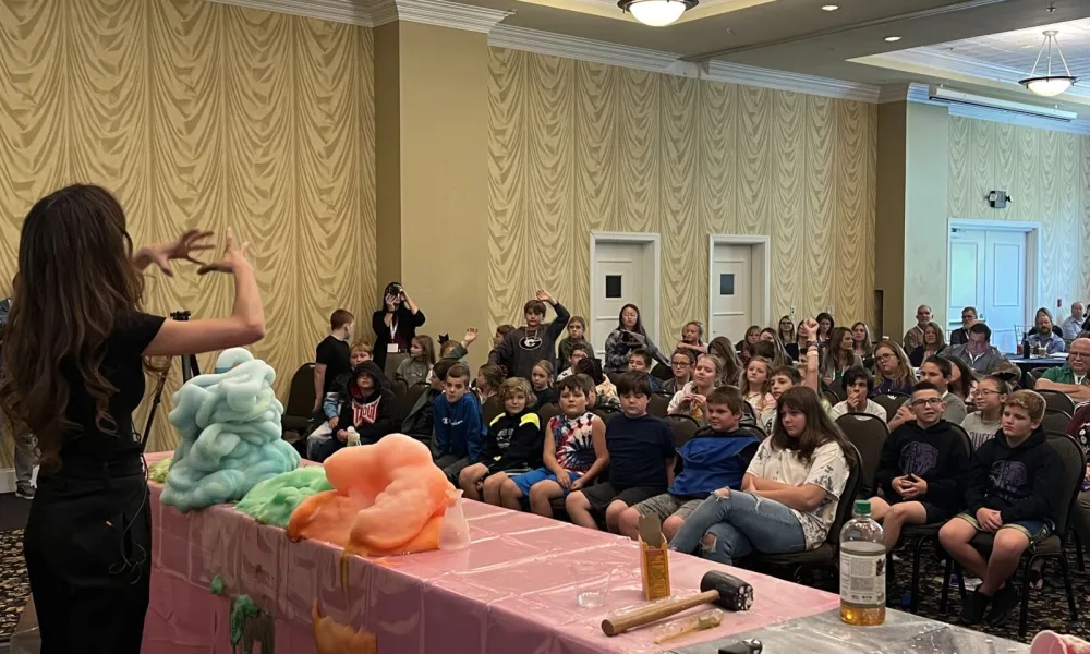 Jennifer Calendrelli performing science Experiment at the CTE Wild & Wonderful Fall 2023 Adminstrators Conference