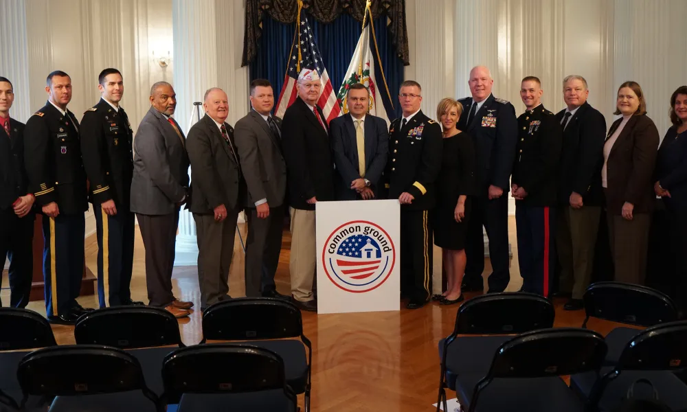 Group shot of all of the individuals participating in the 2018 Common Ground Partnership compact signing