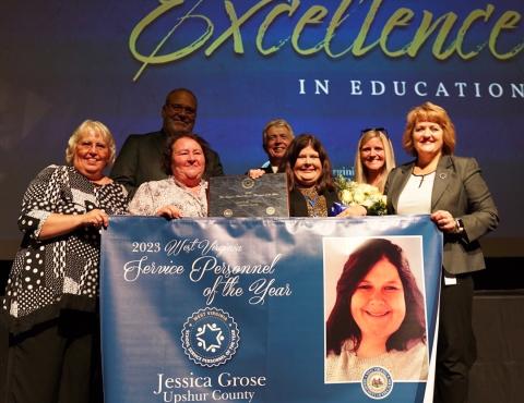 Group photo with 2023 Service Personnel of the Year Jessica Grose.