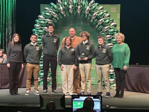 Huntington high school team holding first place trophy