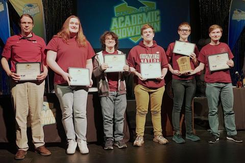 Pictured is Bluefield High School posing for a group photo with a second-place Academic Showdown trophy.