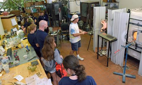 Students gathered to watch glass blowing at a 2023 Governor’s School of Literacy through Arts, Culture, and History event